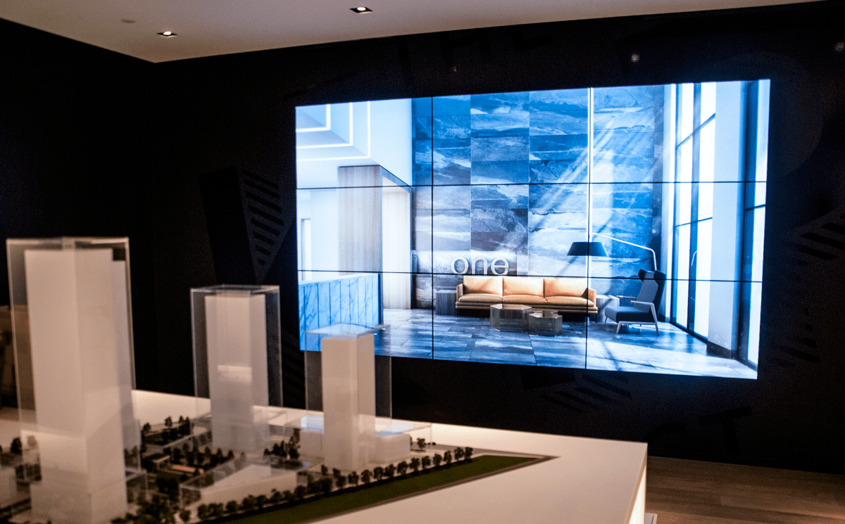 signcast digital signage video wall video walls portflio example of 9x9 video wall showing one large image in building